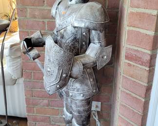 There is a pair of these knights in shining armor guarding the sunroom