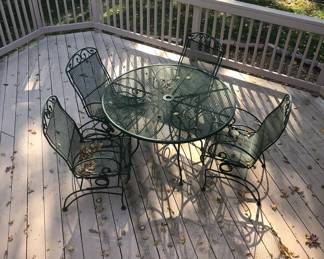 WROUGHT IRON PATIO TABLE AND 4 CHAIRS