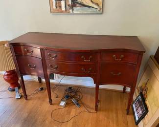 Side buffet. Very nice piece. Overall excellent condition. Has a bit of dirt and tiny bit of micro scratches on top. My favorite part of this piece is that it pushes all the way up against the wall in back although the legs go around shoe and base molding. 62" wide, 23' deep (in middle at deepest part), 37" high. $300