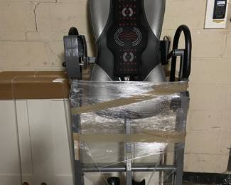 Innova massaging inversion table. Love this thing. Don't have room for it at my new place. Brand new condtion. Wrapped up cause I just shipped it back from California. $50. 