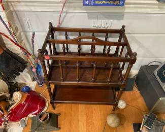 Many small items. This vintage magazine stand $50. 