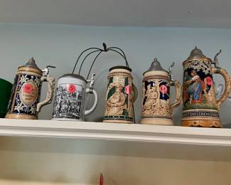 ***Large stein sold. All others available. ***  German beer steins. Antique. Maybe 100 years old. Maybe less. Certainly haven't moved in 45 years. priced to sell!