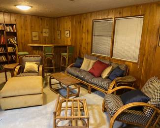 Rattan furniture set. Could use some love. Honestly, pledge might bring most of it back to life, but it does need some repair to the little wicker straps in places (amazon sells a kit for $11). Cushions in bad state of repair except the accent pillows which come with it. Includes a living room set (one couch, two armchairs, coffee table, footstool, two end tables--$700). Bar set sold. Randomly, there's a non-matching footstool you can also have!