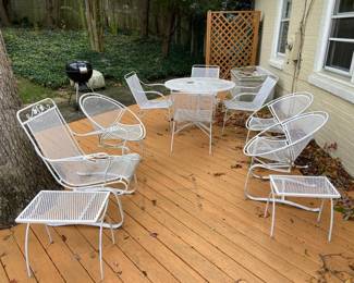 Large set of wrought iron outdoor furniture. Very elegant. Back in style!!! Has cushions to go with it. Excellent condition. Reconditioned with rustoleum one year ago. No pitting/issues. $2,000 for circular table, 4 chairs, rocker and 3 end tables. Elsewhere the rocker alone goes for over 1,000. This is vintage, irreplaceable furniture and priced to sell. ***UPDATE*** Three circular chairs were sold. 