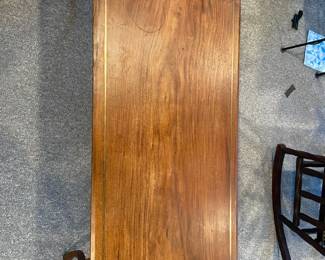 Small coffee table. One of many, many tables in the house. 48" wide by 23" deep by 18" tall. $70