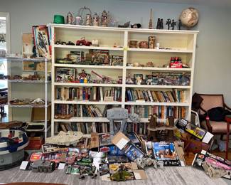 Very large, stately bookshelf. Solid, solid wood. This is good, vintage construction. Really can be a focal point of a room. Will post exact dimensions later, but approximately 6' 4" tall, 8' wide. $300.  Also, lots of other stuff going on here. All for sale. Star Wars lot sold already but tons and tons of G. I Joes. 45 figurines. Cobra Command Center and GI Joe Headquarters. Other G. I. Joes. Voltron. Lots and lots of stuff. 
