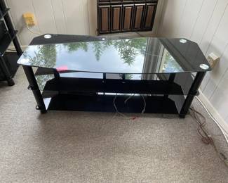 TV stand/entertainment center. Has matching tower for accessories next to it (sorry no pic together). $50 for the set. 