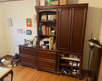 Office shelving/drawer unit. In generally excellent condition. Looks like it is offset in this picture, but it is not. Originally from Bombay company, which no longer exists, I think. Quality stuff. Not vintage or antique. 85" wide across all three units, 81" tall (bigger units), 18" deep.  