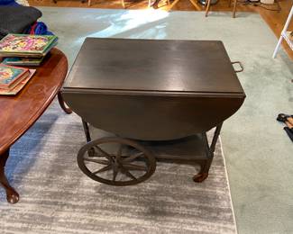 Vintage mid century colonial drop leaf tea cart in Solid mahogany (with original sticker). Great condition. Has frame of a top not pictured here. $200.