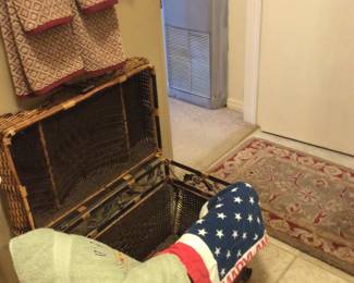 There are 2 large wicker trunks available