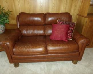 Leather Love Seat and pillows