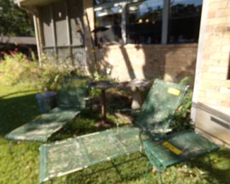 Outside Metal Chase Lounge Chairs