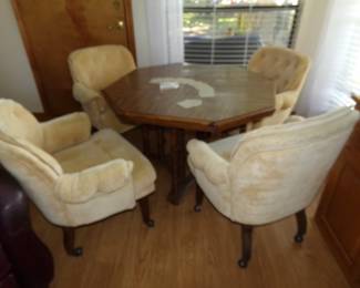 Hard Wood Card Table with Four Cushioned Roller Chairs