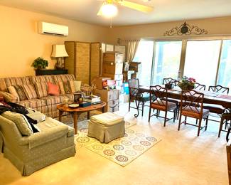 Sofa bed, pair of club chairs, 6 panel folding screen, butler’s tray coffee table, iron and wood dining table, 8 chairs