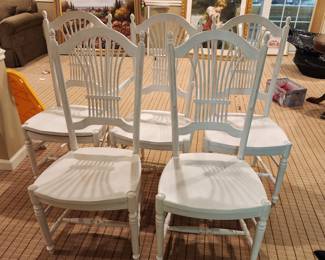 set of 6 antique white painted chairs.  Relocated to the garage because we needed the space
