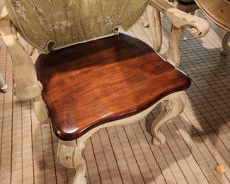 distressed wood painted base dining table with 6 matching chairs w/ cushions.  The chairs are sold with the table