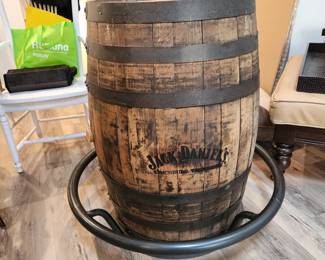 Jack Daniels whiskey barrel pub table, with heavy wooden topauthentic Jack Daniels whiskey barrel table with metal footrail & glass top center
