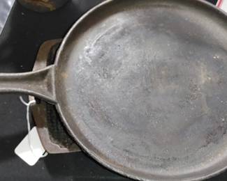 Cast iron griddles brought in from the barn