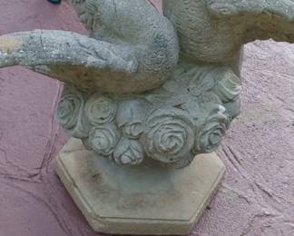 Vintage concrete kissing doves