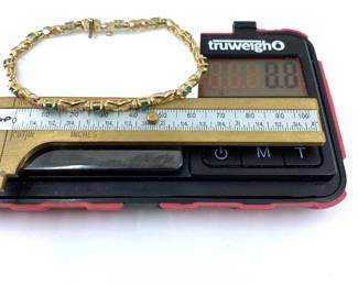 This 14K yellow solid gold bracelet with natural diamonds and emeralds is on sale for $528. The size and weight in grams is shown on the picture. Please call or text 703-895-9344 to buy or for questions.