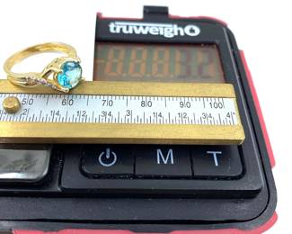 This 14K solid yellow gold ring with natural diamonds and a blue topaz is on sale for $192. The size and weight in grams is shown on the picture. Please call or text 703-895-9344 to buy or for questions.