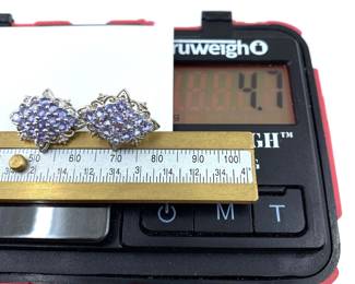 These 14K solid white gold earrings with tanzanite gemstones are on sale for $282. The size and weight in grams is shown on the picture. Please call or text 703-895-9344 to buy or for questions.