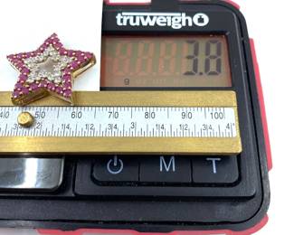 This 14K solid yellow gold pendant with natural diamonds and ruby gemstones is on sale for $228. The size and weight in grams is shown on the picture. Please call or text 703-895-9344 to buy or for questions.