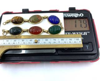 This 14K solid yellow gold bracelet with mixed gemstones is on sale for $1074. The size and weight in grams is shown on the picture. Please call or text 703-895-9344 to buy or for questions.