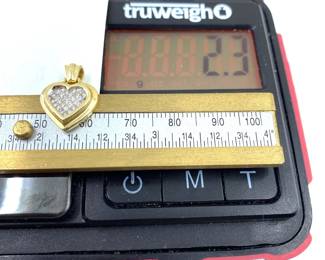 This 14K solid yellow gold pendant with natural diamonds is on sale for $138. The size and weight in grams is shown on the picture. Please call or text 703-895-9344 to buy or for questions.