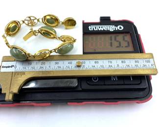 This 14K solid yellow gold bracelet with natural jade gemstones is on sale for $930. The size and weight in grams is shown on the picture. Please call or text 703-895-9344 to buy or for questions.