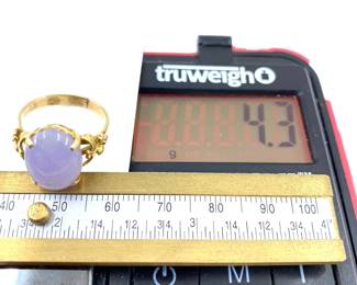 This 14K yellow solid gold ring with a natural purple jade gemstone is on sale for $258. The size and weight in grams is shown on the picture. Please call or text 703-895-9344 to buy or for questions.