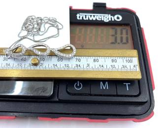 This 14K solid white gold pendant necklace with natural diamonds is on sale for $180. The size and weight in grams is shown on the picture. Please call or text 703-895-9344 to buy or for questions.