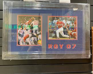 This signed and framed baseball memorabilia of Dustin Pedroia playing for the Red Sox in the 07 MLB World Series is on sale. The size is 29 inches wide and 19 inches tall. Please call or text 703-895-9344 to buy or for questions.