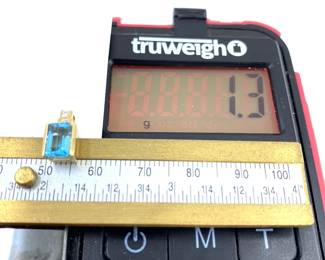 This 14K solid yellow gold pendant with natural diamonds and a blue topaz is on sale for $78. The size and weight in grams is shown on the picture. Please call or text 703-895-9344 to buy or for questions.