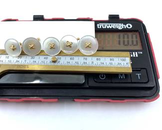 These 14K solid yellow gold buttons are on sale as a set for $600. The size and weight in grams is shown on the picture. Please call or text 703-895-9344 to buy or for questions.