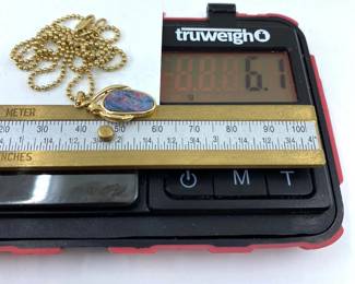 This 14K solid yellow gold necklace with a natural opal gemstone is on sale for $366. The size and weight in grams is shown on the picture. Please call or text 703-895-9344 to buy or for questions.