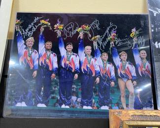 This large signed Olympics memorabilia featuring the Magnificent 7, the USA gold medal-winning team at the 1996 Olympics in Atlanta is on sale. The size is 20 inches wide and 16 inches tall. Please call or text 703-895-9344 to buy or for questions.