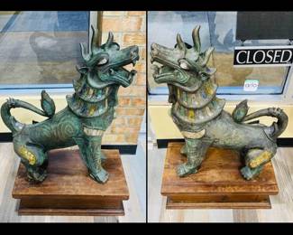 These antique 20th century 1900 bronze life size Thai foo dog statues are on sale for $4000. The statues are encrusted with jade amethyst rose quartz on the ears, neck, chest and legs as shown in the pictures. This is only being sold as a set so please do not ask for only one. Please call or text 703-895-9344 to buy or for questions.

Statue Size:
Height: 35 in (88.9 cm)
Width: 28 in (71.12 cm)
Depth: 12 in (30.48 cm)

Wood Pedestal Size:
Height: 8.5 in (21.59)
Width 13.5 in (34.29)
Depth 12 in (30.48 cm)