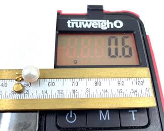 This 14K solid yellow gold pendant with a natural pearl is on sale for $36. The size and weight in grams is shown on the picture. Please call or text 703-895-9344 to buy or for questions.