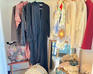 vintage hats, Yves St. Laurent dresses, antique children's gowns