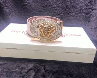 White Versace Belt, normal wear and tear for a vintage belt. 
