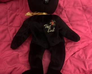 Beanie baby in black “this is the end”