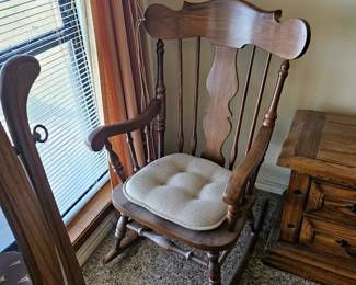 Nice wood rocking chair.
