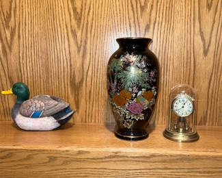 Duck decor, floral vase, and anniversary clock