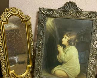 ornate frame with girl praying