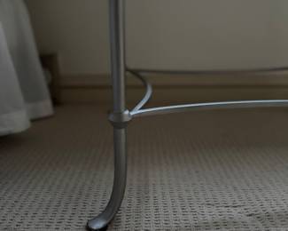 Oval Glass-Top Iron Side Table In Silver Finish. Measures 36" x 24" x 24" H. Photo 3 of 3.