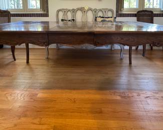 French Provincial Lattice Top Extension Dining Table. Measures 44" W x 66" L. Extends to 130" with 4 Leaves. We Love As Is But Are Impressed with Tara Shaw's Antique Finishes. How Would Amy Howard's Grey Paint Look On This Table? Ask Us For Resources! Photo 2 of 5.