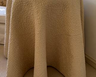 Particle Board Side Table with Quilted Cotton Tablecloth. Measures 30" H x 24" D.