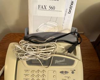 Old skool, but still works and has ALL accessories and manuals! Brother FAX 560!