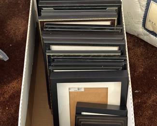 Every sale has picture frames, but this sale has LOADS of them AND they are all in excellent or are NEW! This is the box of black frames in assorted sizes! 